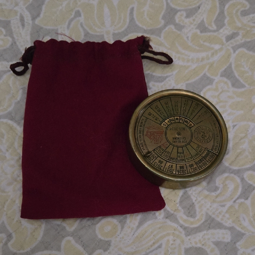 Brass Astrological 40 year calander  with Red Pouch